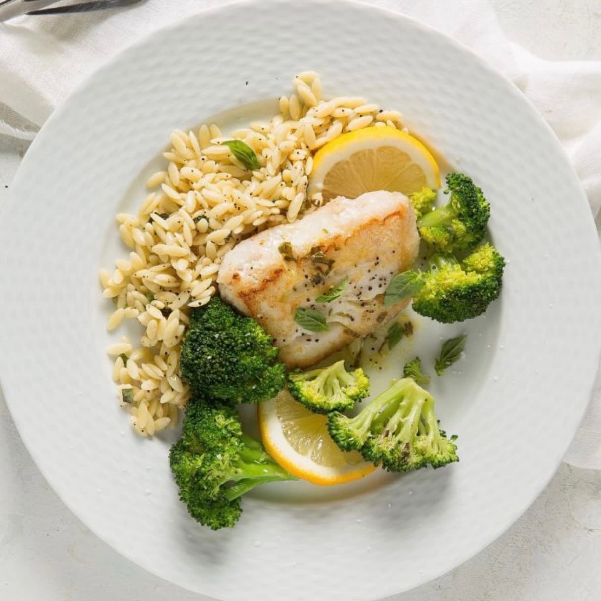 Lemon Butter White Fish, Lime Buckwheat and Steamed Vegetables with Herbs